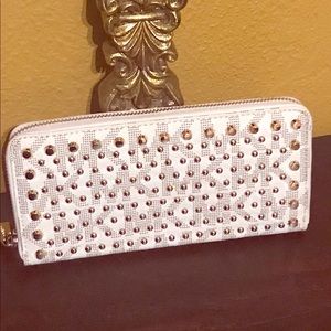 Authentic MK stud wallet !